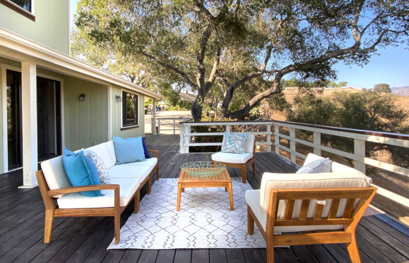 Main outdoor deck space with teak wood 6-piece patio set