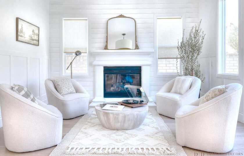 Formal living room home staging featuring four fox shearling barrel chairs from Lattitude Run