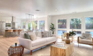 Delicious Decors' California Comfort home staging design blends organic materials with light upholstered furniture, neutral accents, and modern flair.