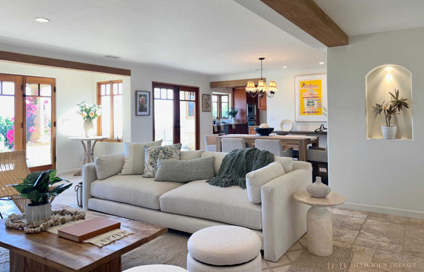 The staging makes use of a mix of colors, including a couple of pops of yellow in the flowers and art.